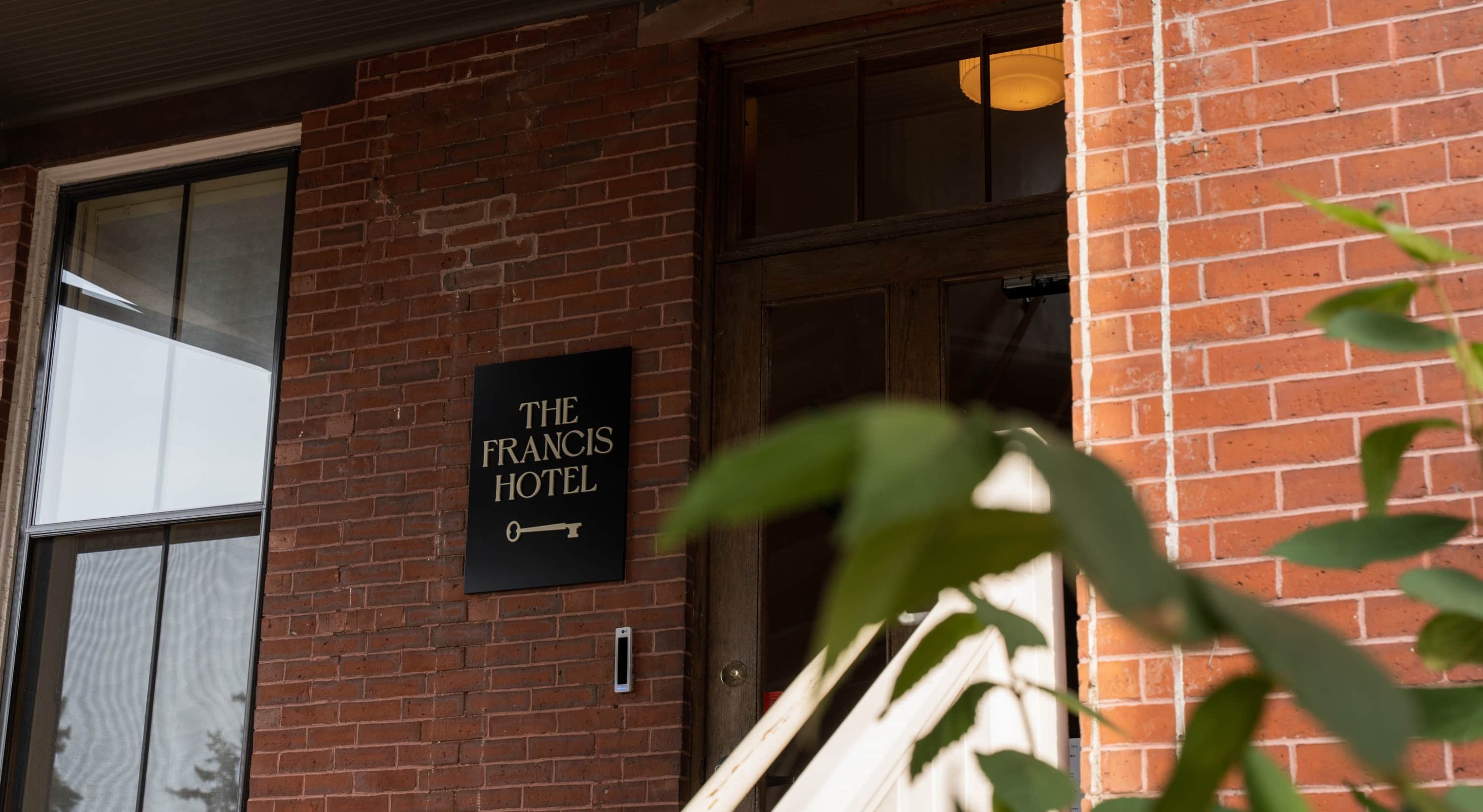 The Francis Hotel's brick facade in Portland Maine's historic West End, a luxury boutique.