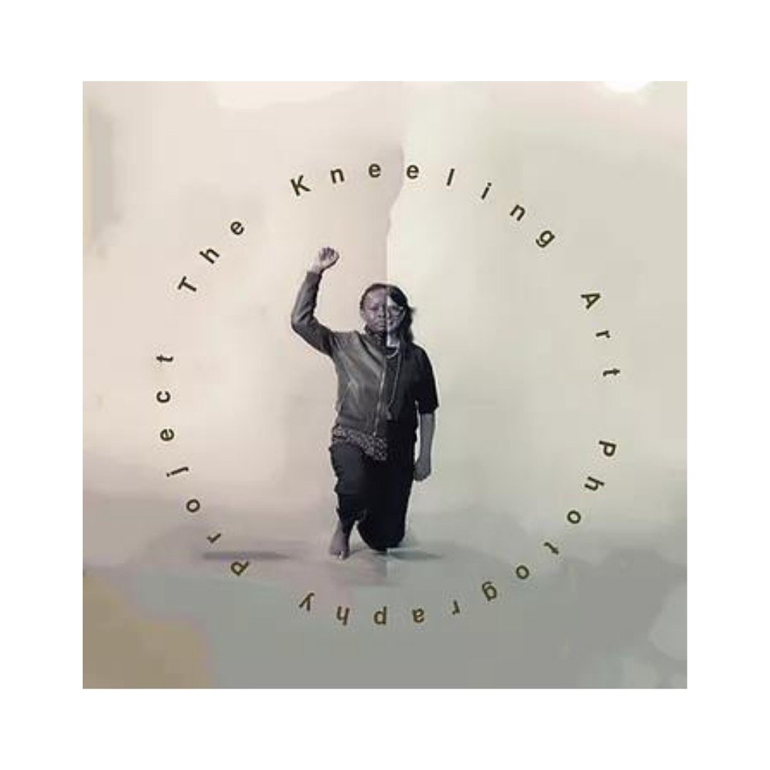 Man kneeling with raised fist in a circular text The Kneeling Art Photography Project.